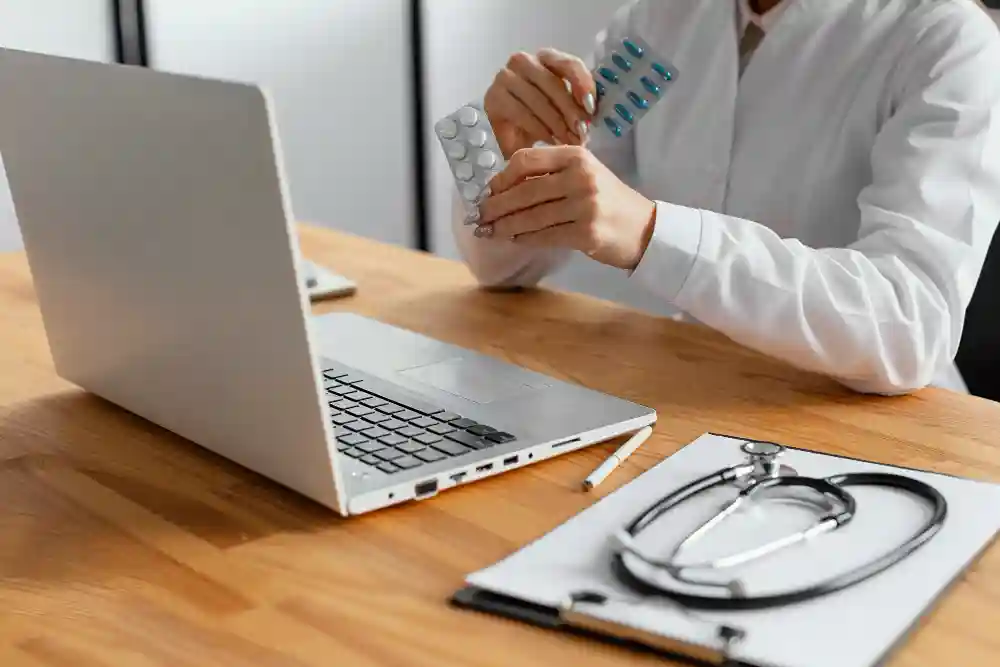A healthcare provider discussing medication safety and treatment plans with a patient.
